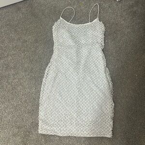 White dress with pearls